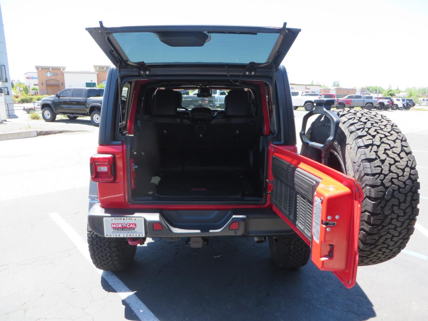 2019 Red /Black Jeep Wrangler Unlimited Rubicon (1C4HJXFN7KW) with an 2.0L L4 DOHC 16V TURBO engine, automatic transmission, located at 2630 Grass Valley Highway, Auburn, CA, 95603, (530) 508-5100, 38.937893, -121.095482 - Rubicon JL ready for all of your offroad adventures. This Jeep is sitting on a Rubicon Express lift kit, RE 2.5 Extreme series shocks, 17" Method bead grip wheels, 37" BFG KO2 tires, EVO front bumper, Warn winch, Road Armor rock slliders, and a HD Jeep spare tire carrier. - Photo#60